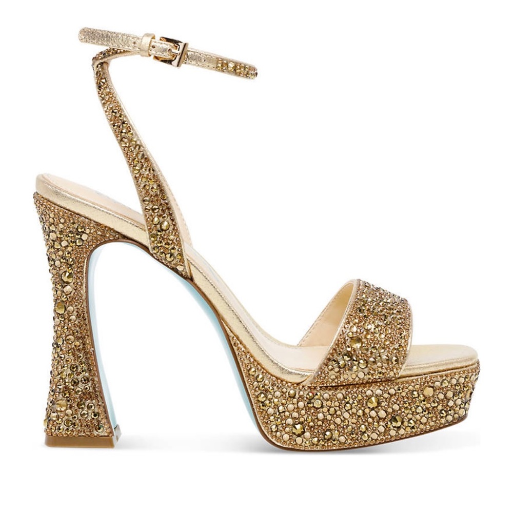 Brand new in box. Gorgeous size 8 gold heels.